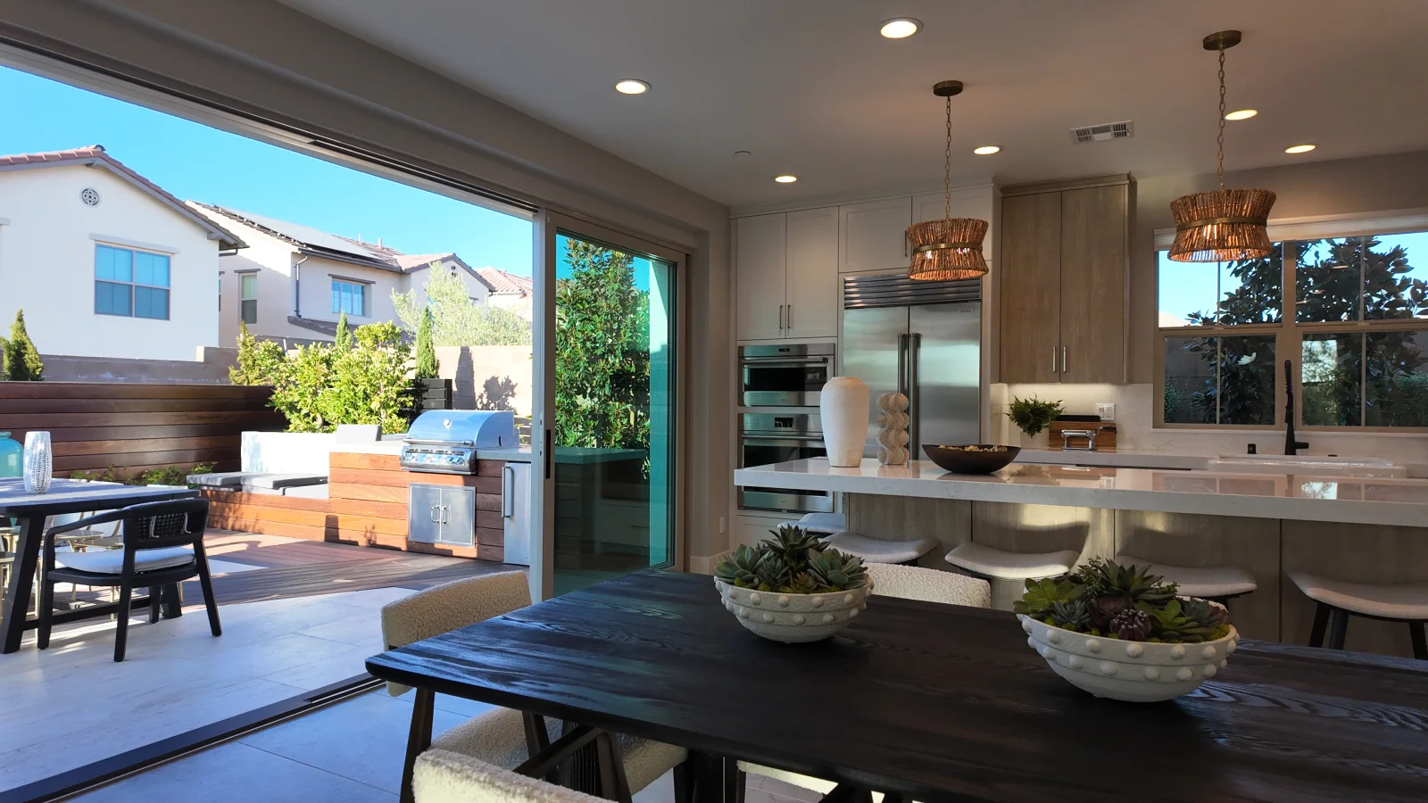 Custom outdoor kitchen installation in Orange County by NHG HOME